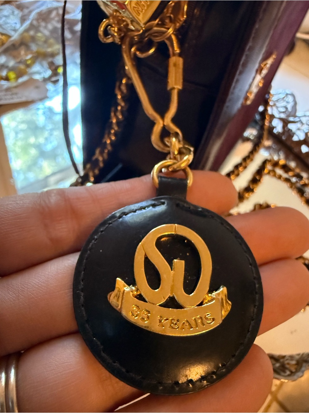 Vintage St. John Keychain 35 anniversary black and gold logo - Picture 3 of 10